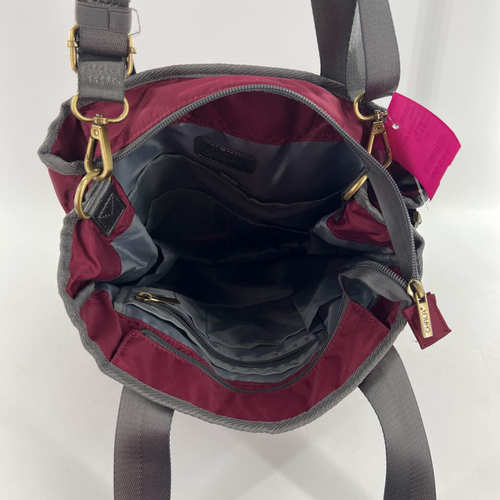 zip around paw print tote