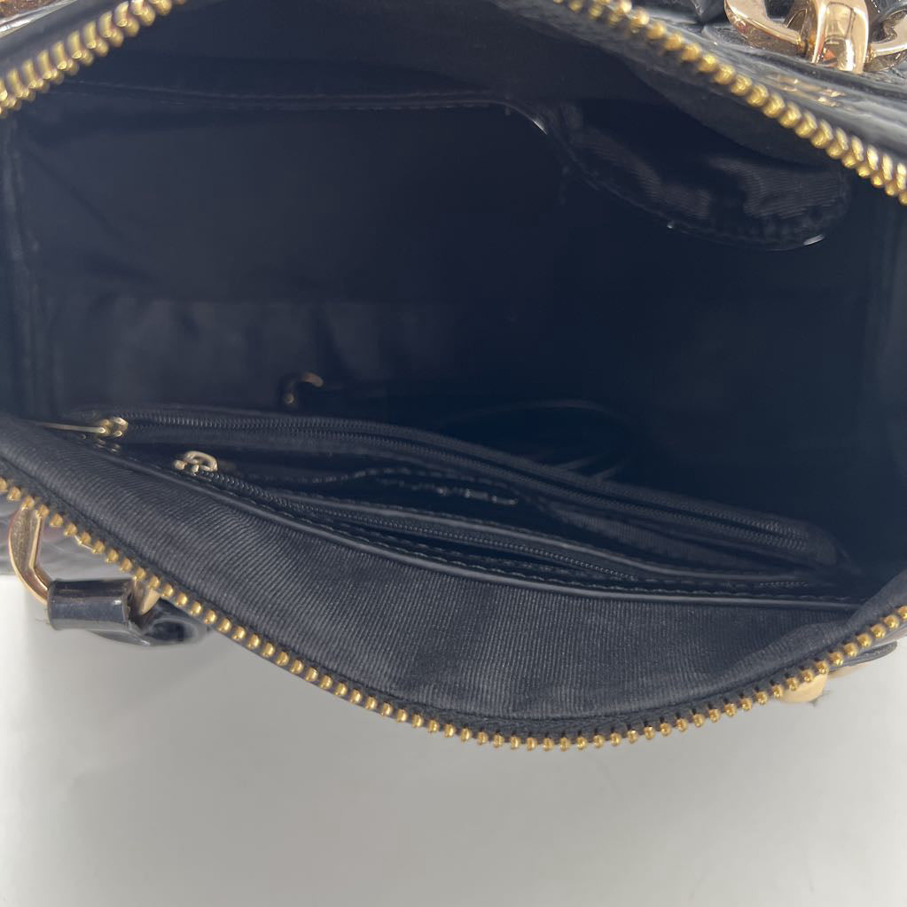 embossed leather handbag