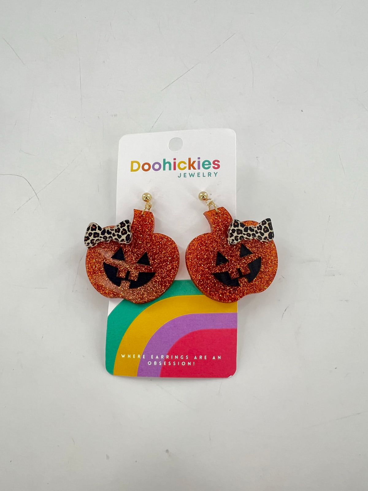 glitter pumpkin dangle earrings-animal print bow