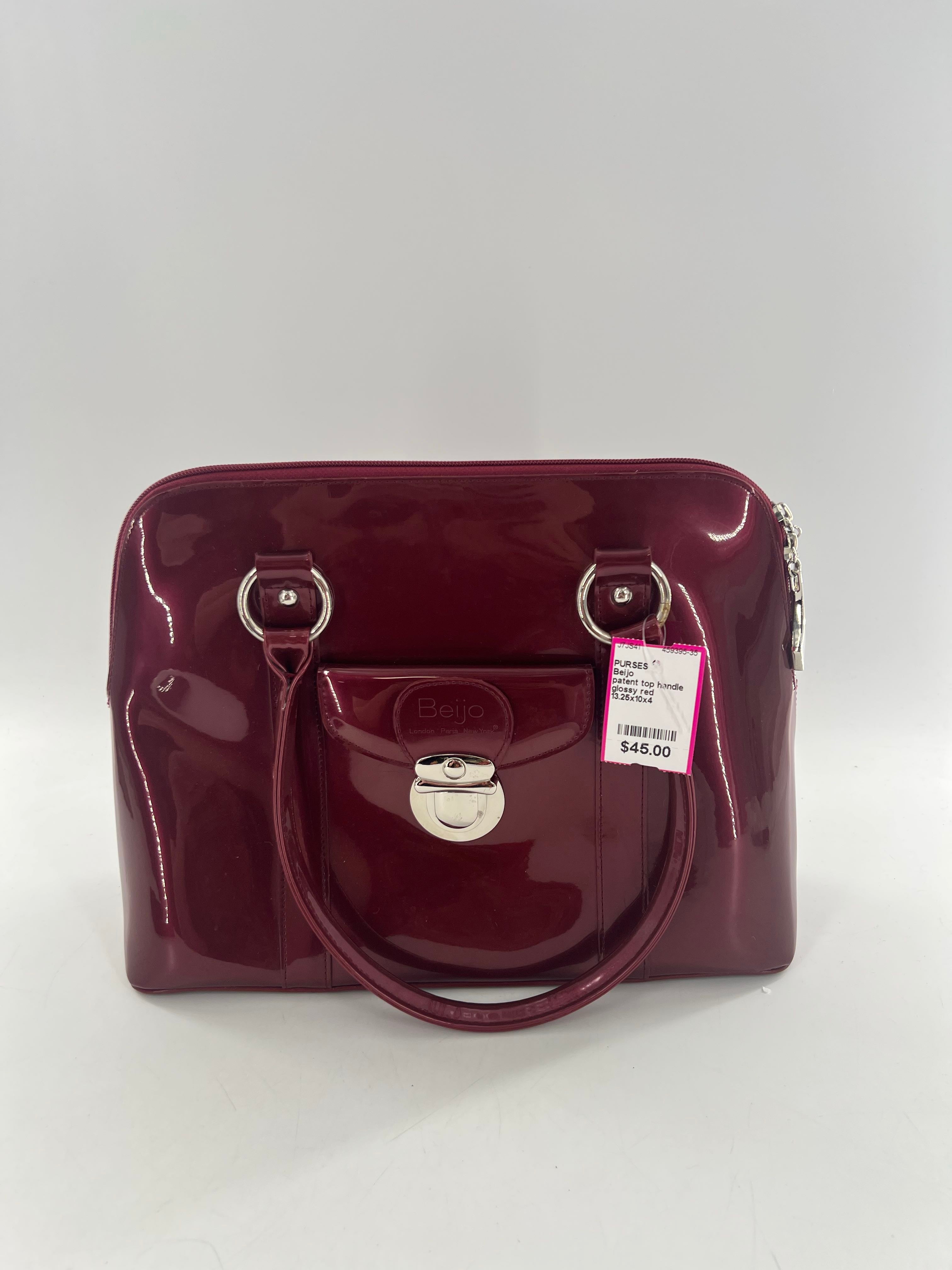 patent top handle front pocket shoulder bag