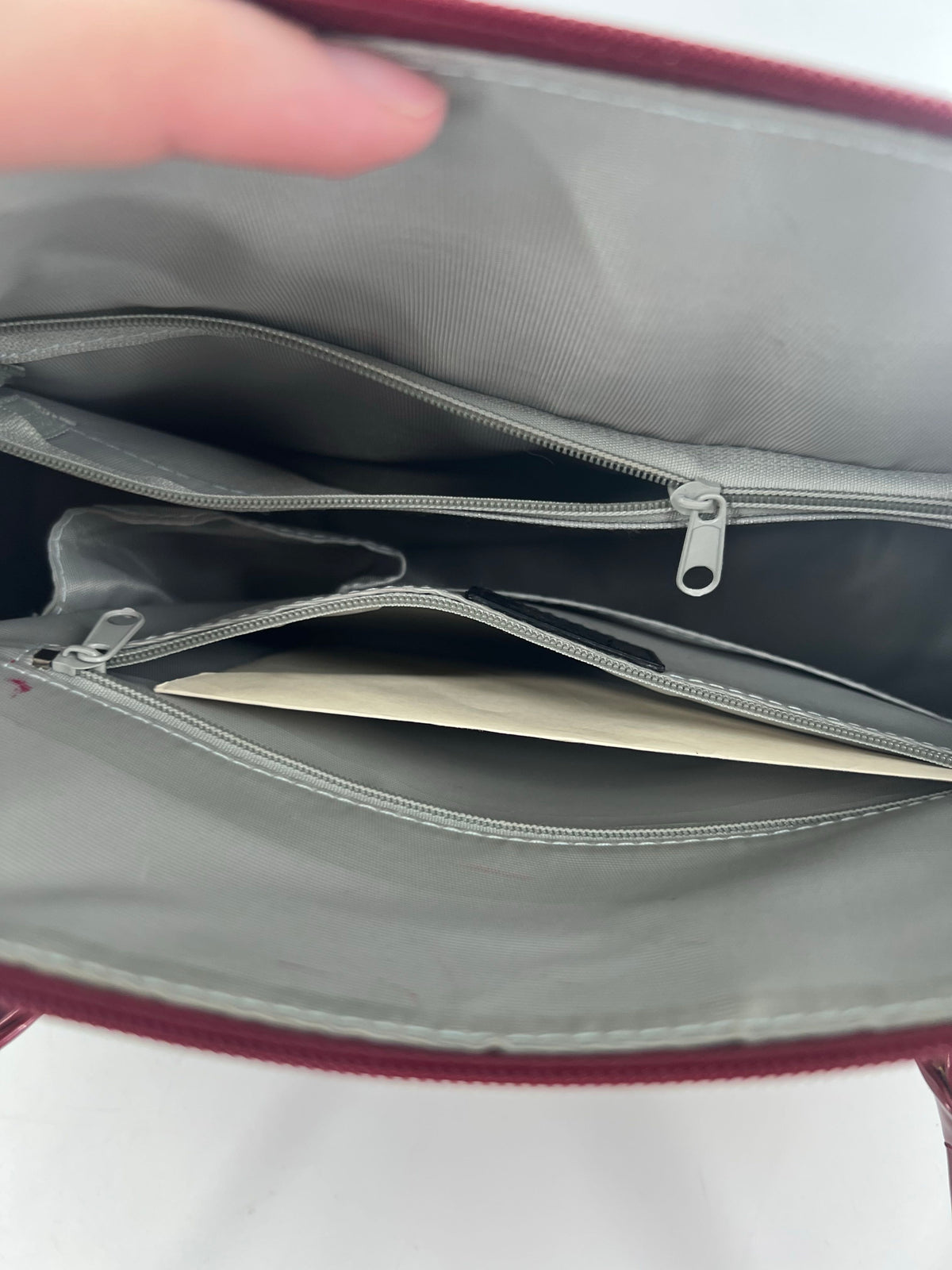 patent top handle front pocket shoulder bag