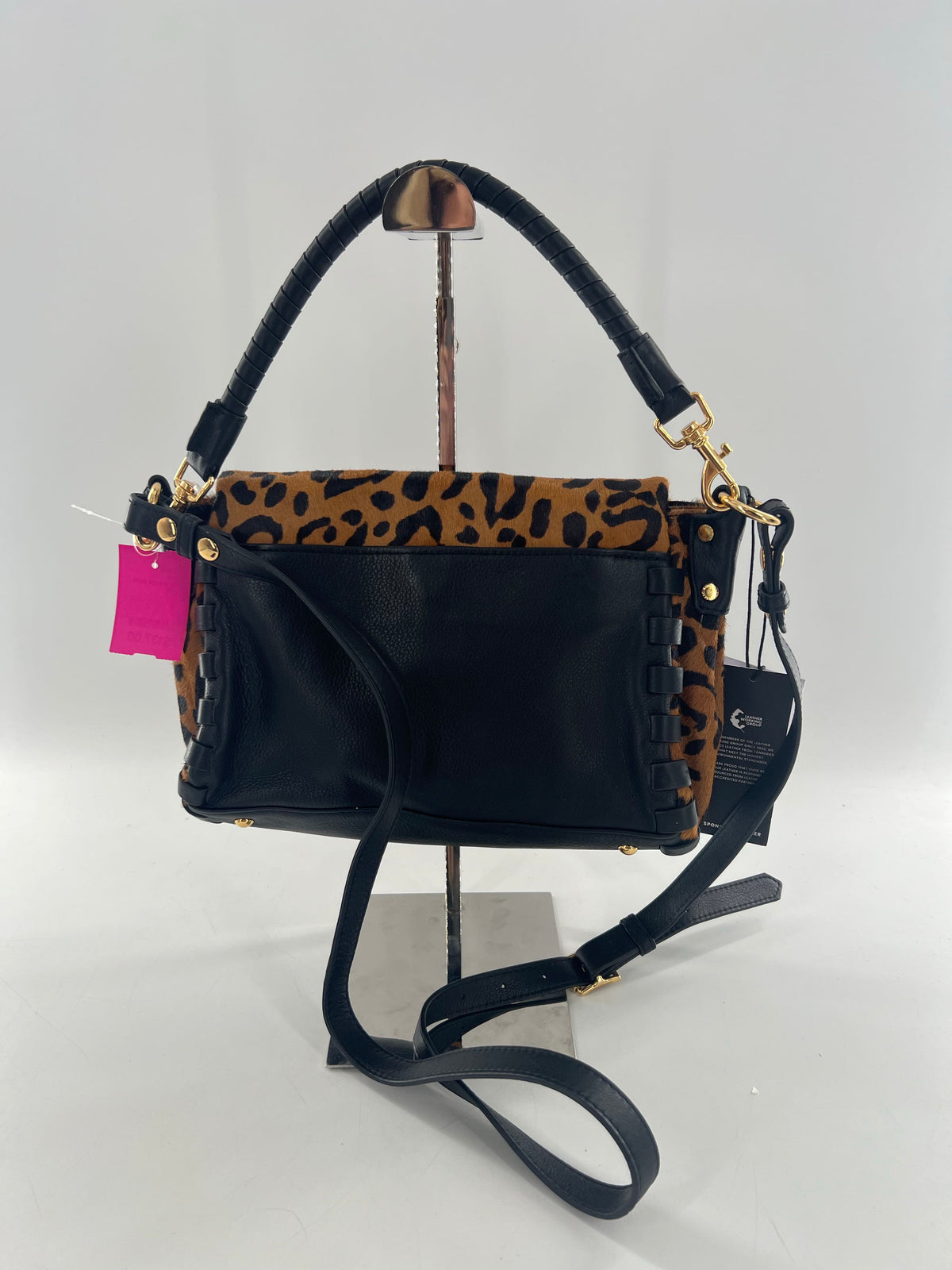 R268 animal print foldover convertible crossbody w/ whipstitch accents