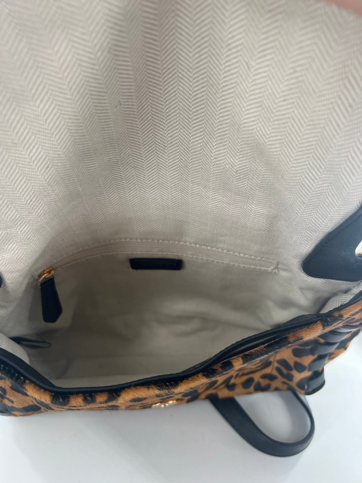 R268 animal print foldover convertible crossbody w/ whipstitch accents