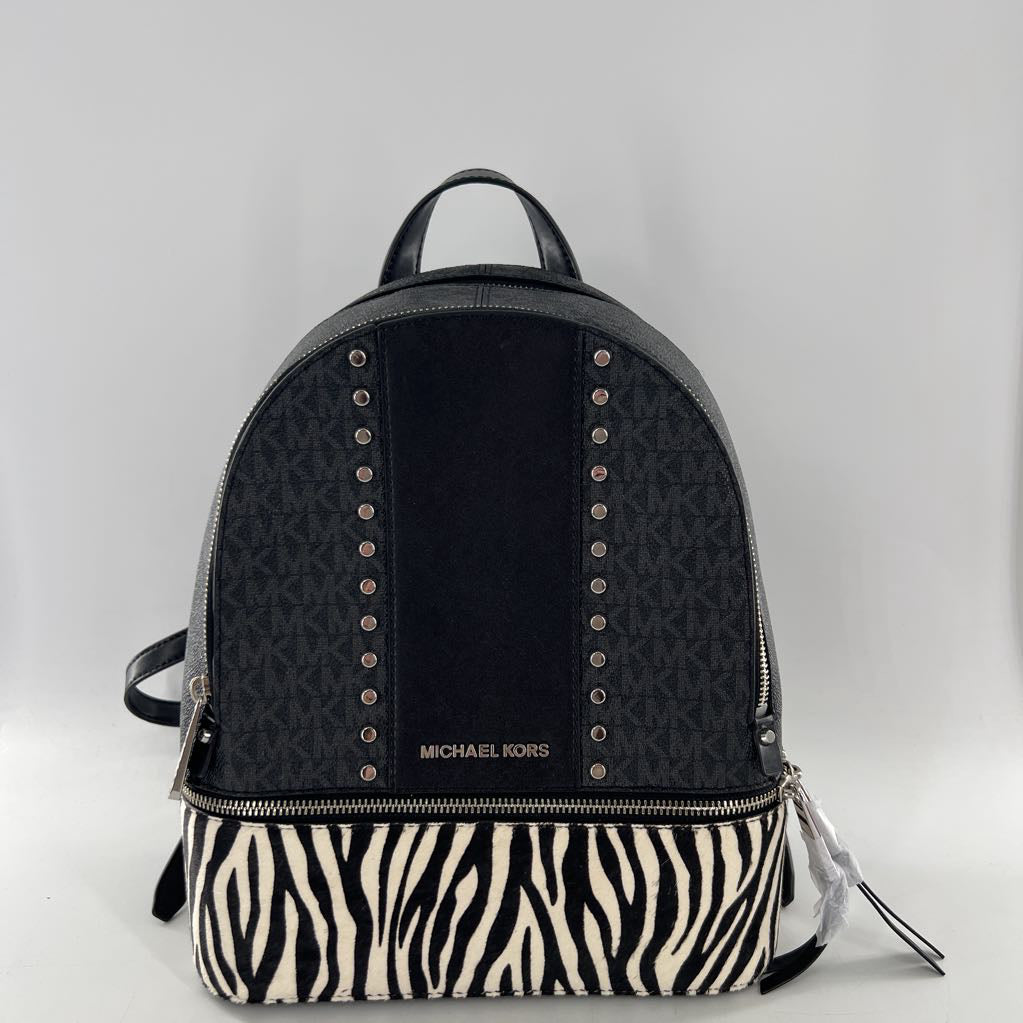 R358 monogram/zebra print studded med backpack