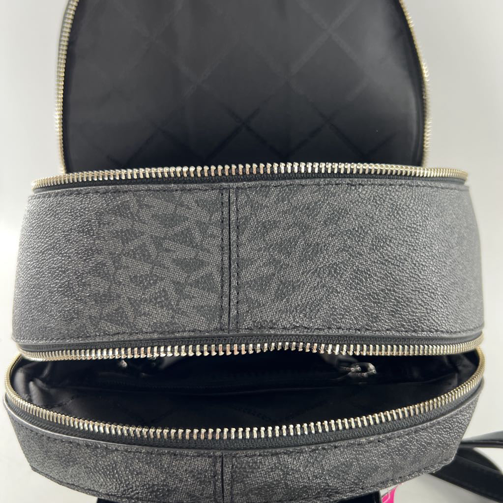 R358 monogram/zebra print studded med backpack