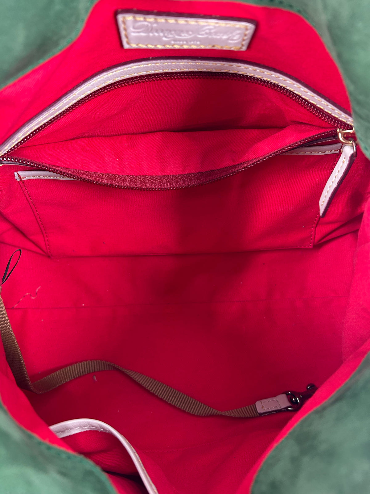 whipstitch handle tassel satchel