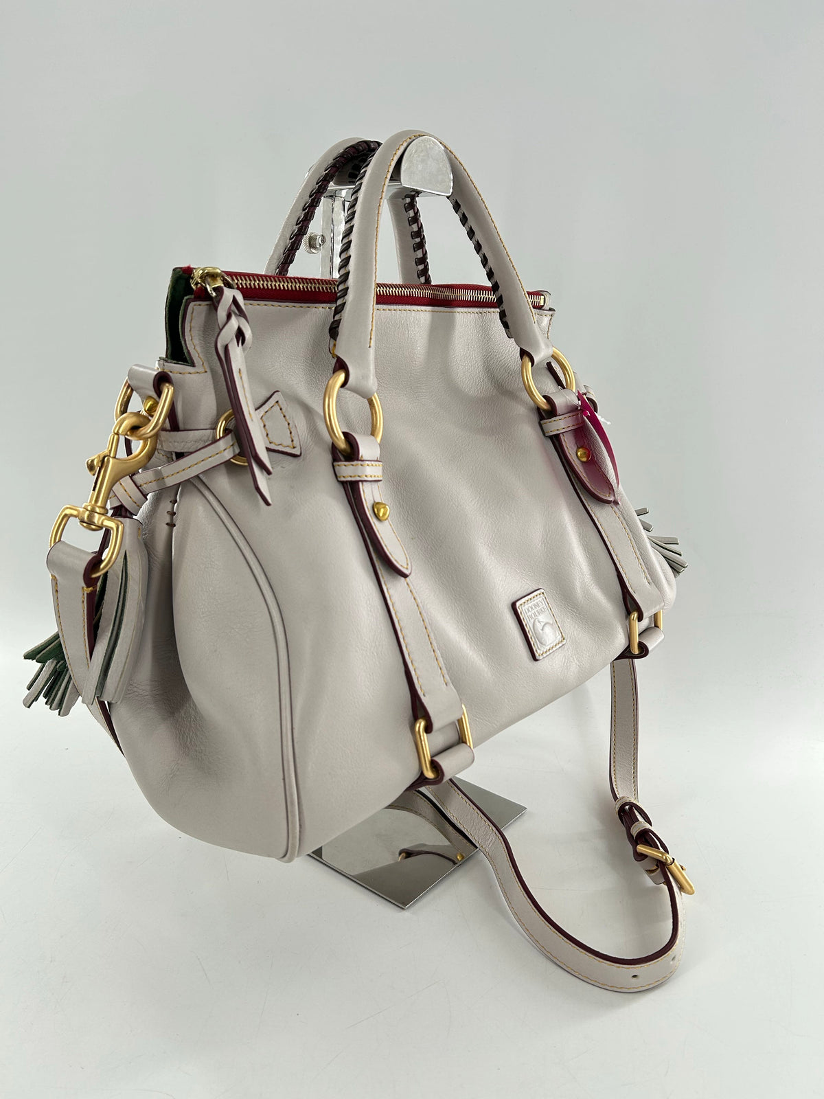 whipstitch handle tassel satchel