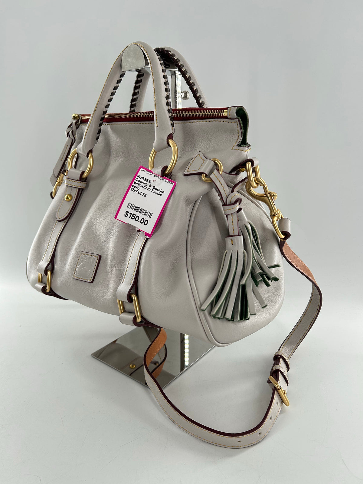 whipstitch handle tassel satchel