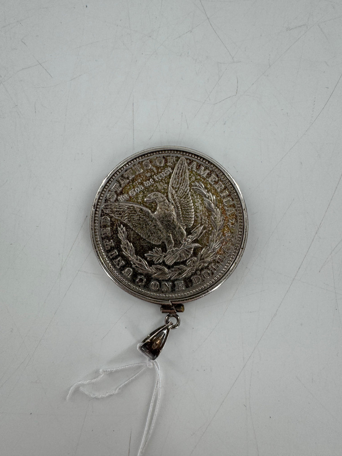 silver coin pendant