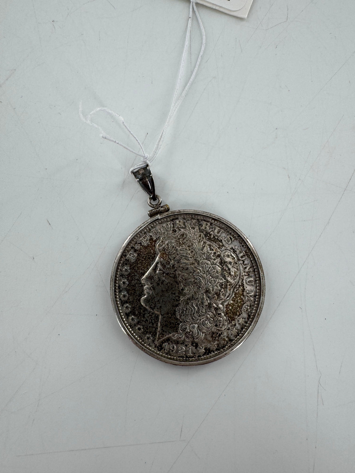 silver coin pendant