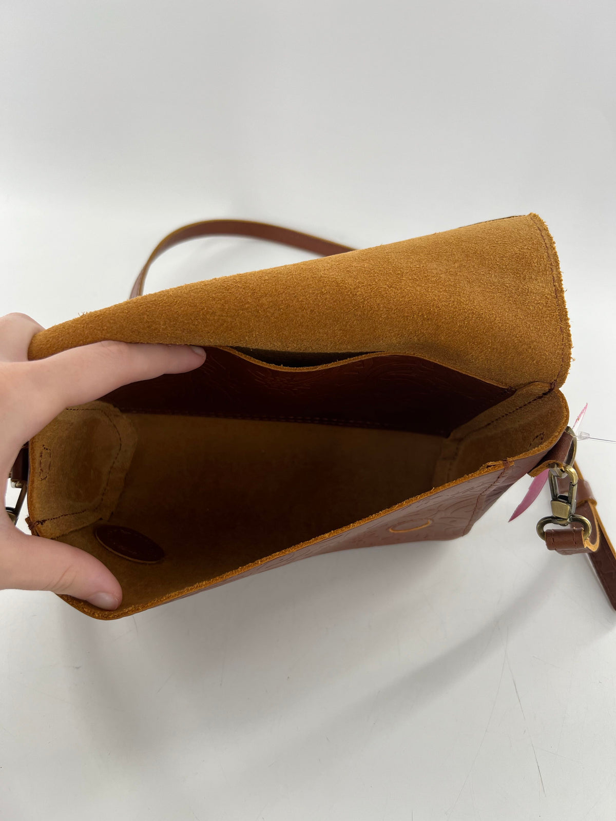 intricate floral & leaf embossed flap crossbody