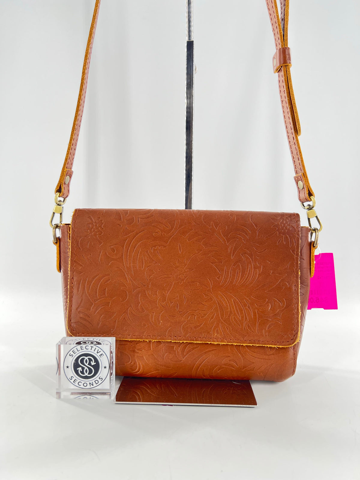 intricate floral & leaf embossed flap crossbody