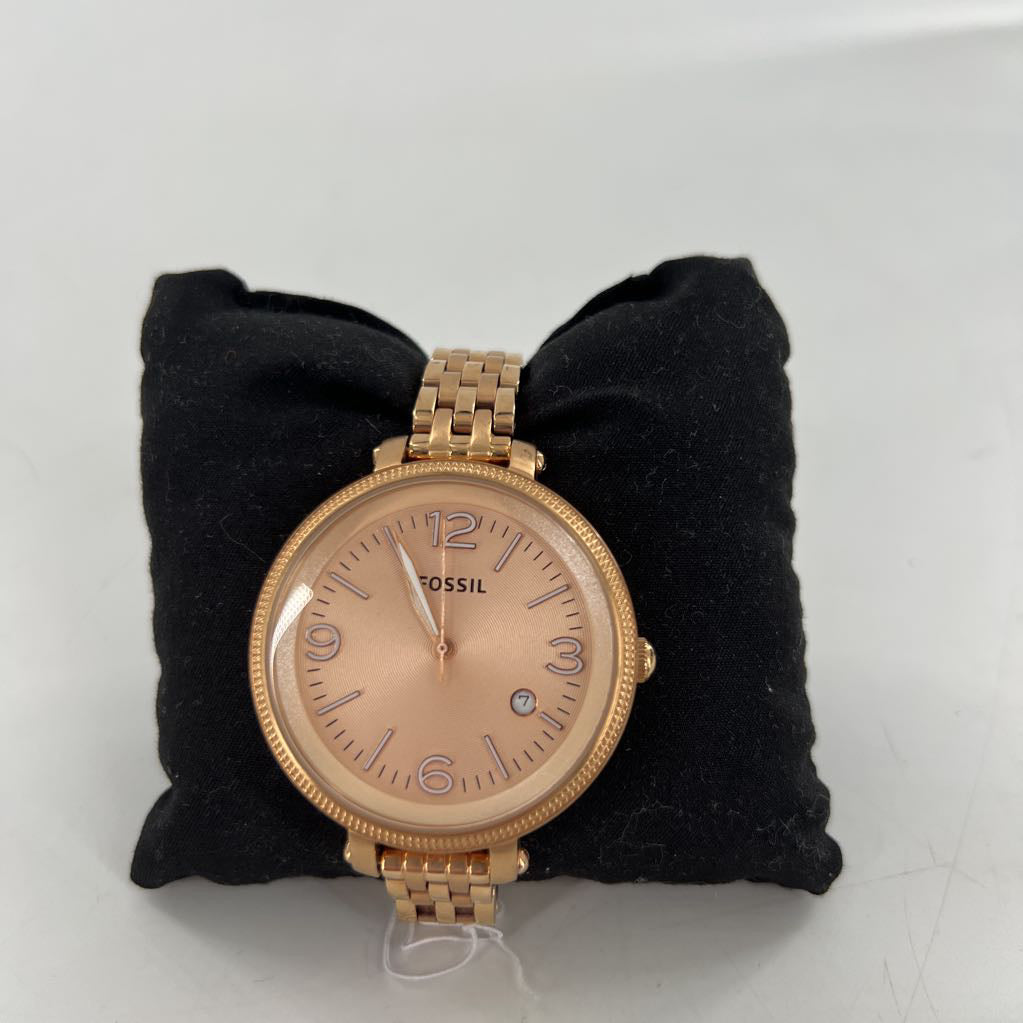 rose gold round face watch