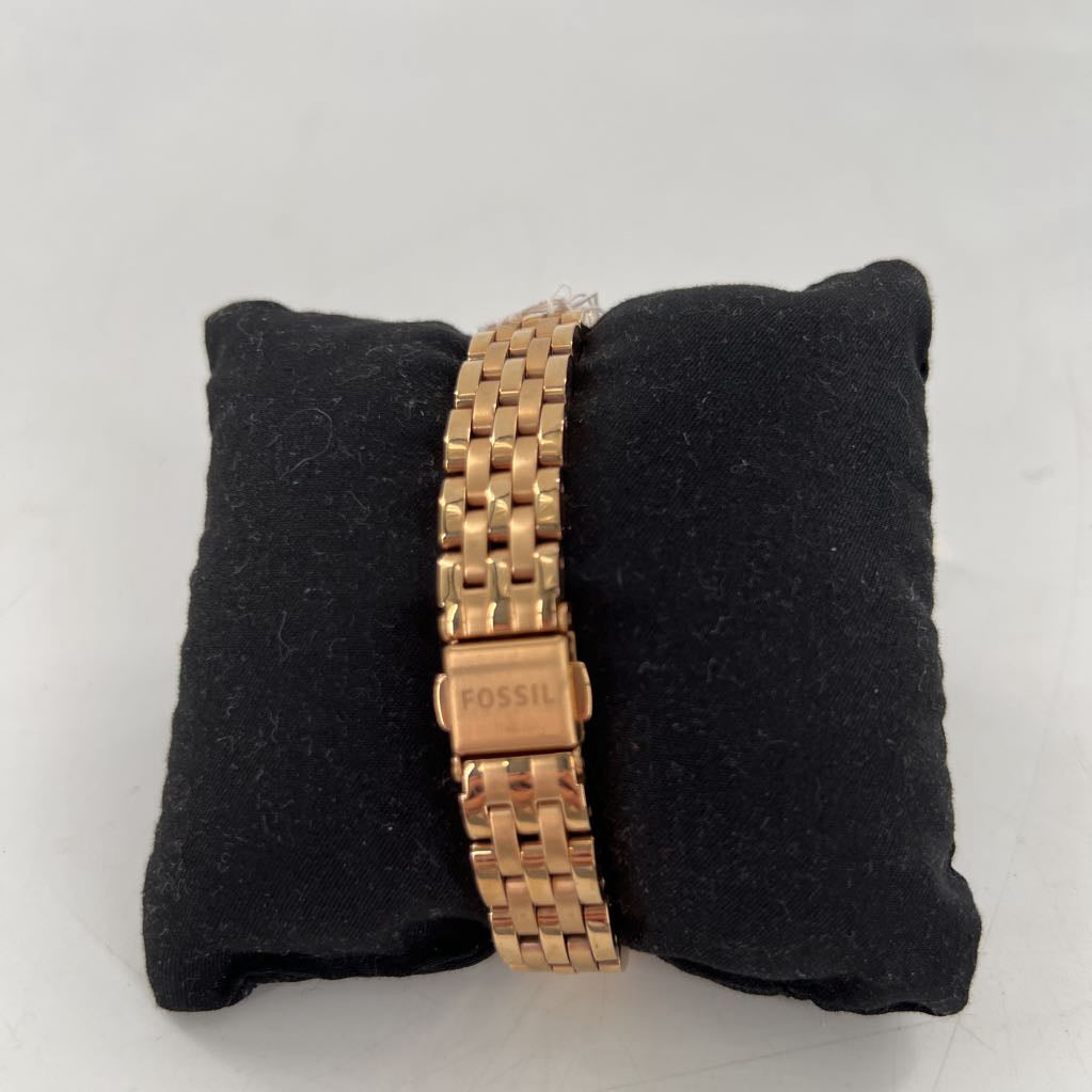 rose gold round face watch