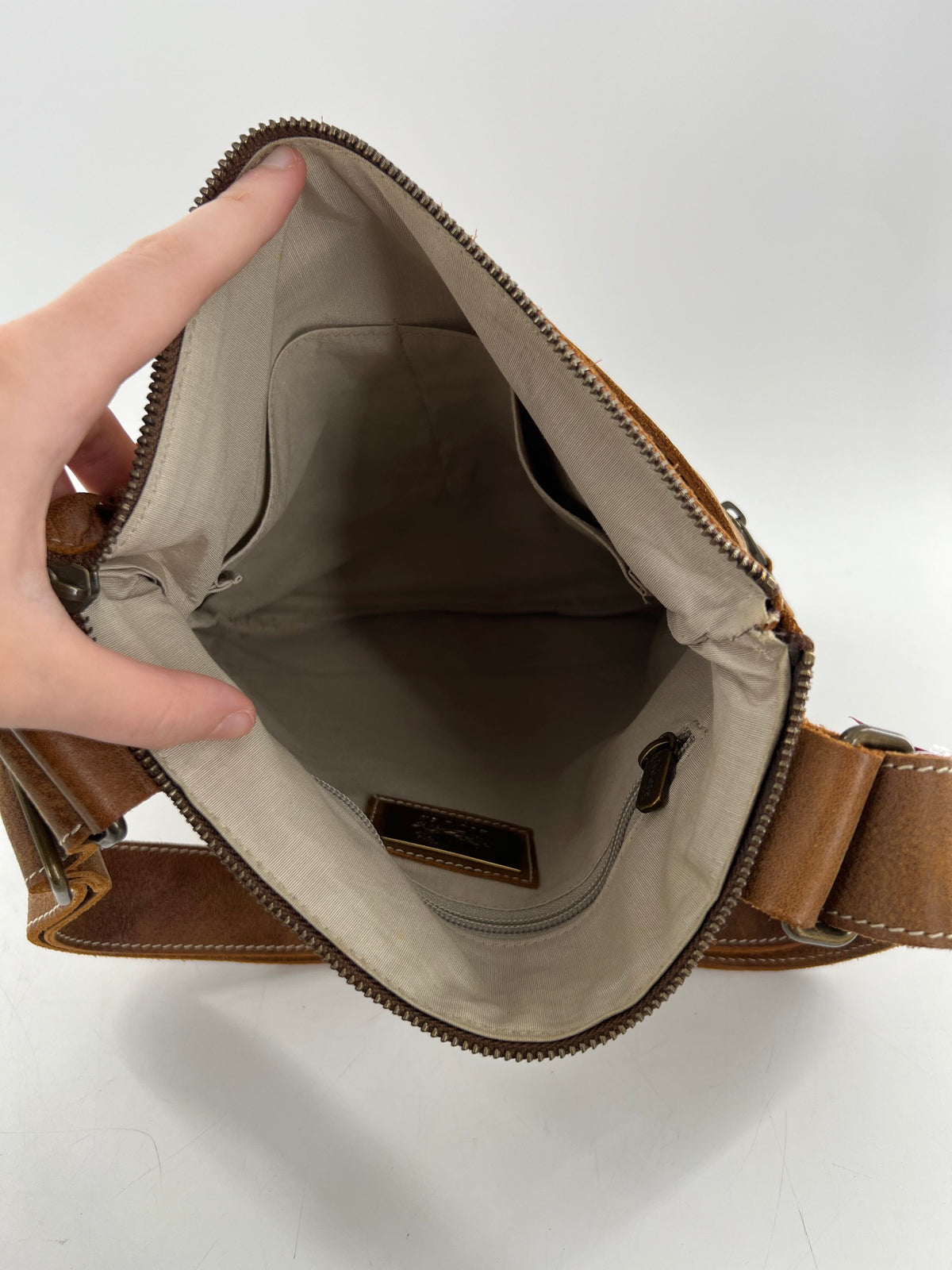 leather circular logo stamp crossbody