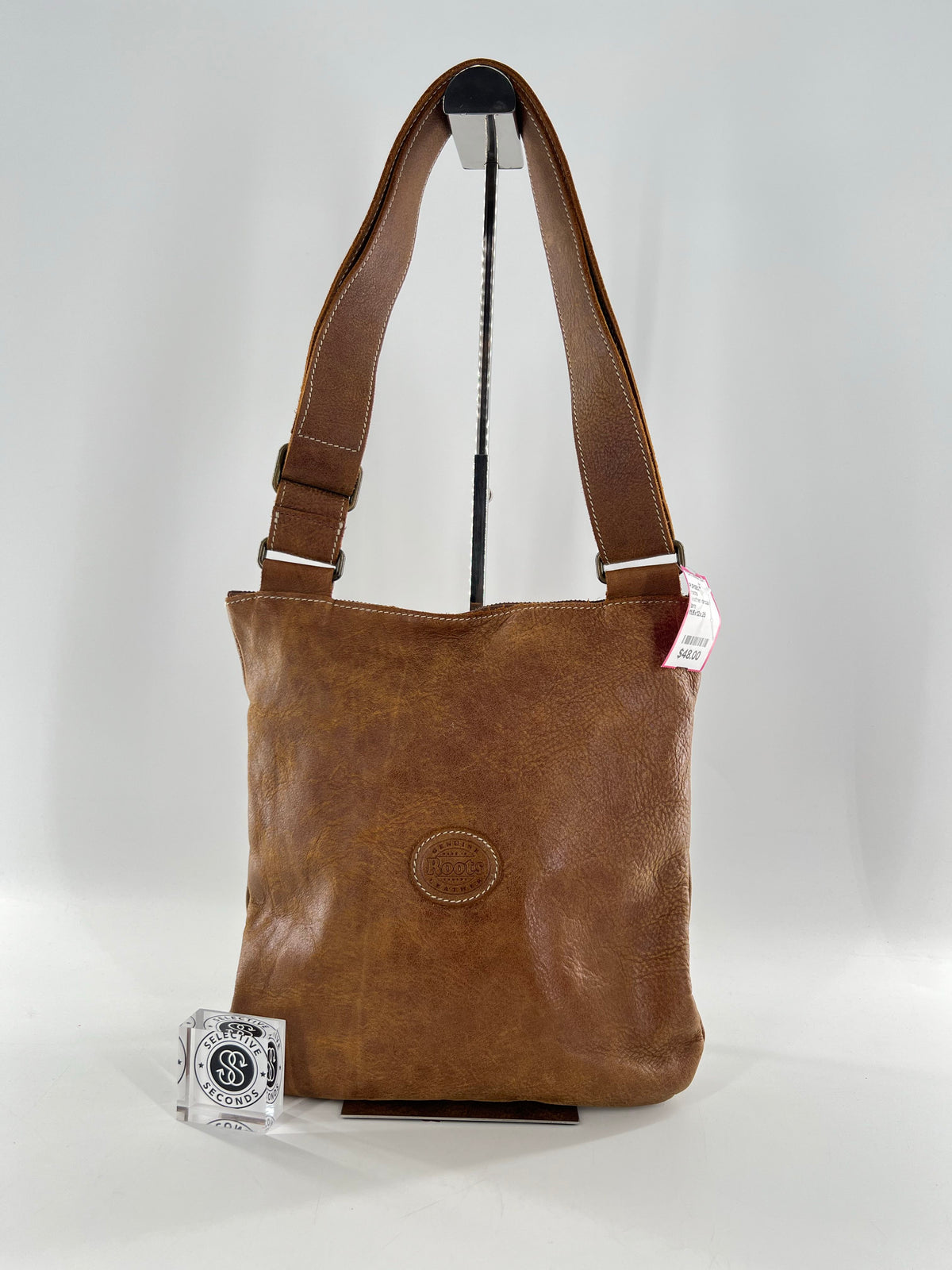 leather circular logo stamp crossbody