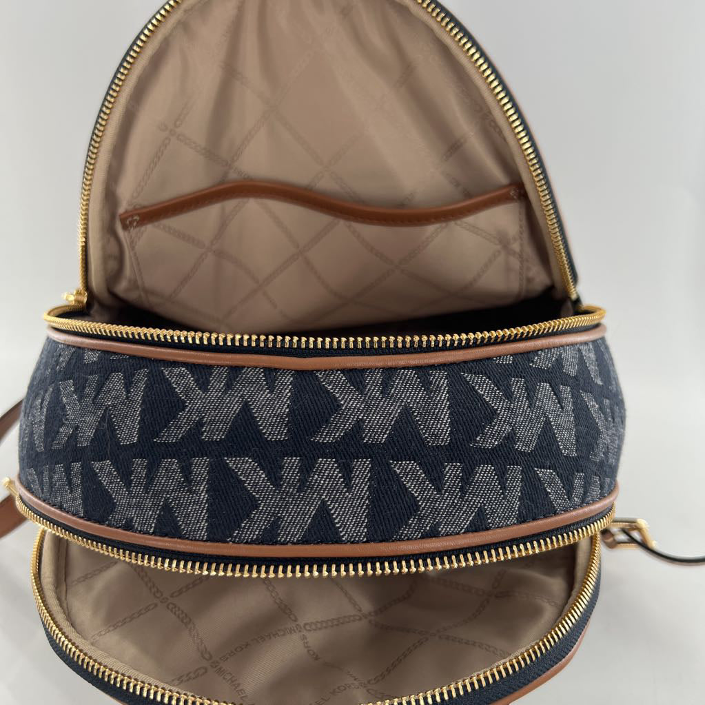 R328 monogram jacquard dernim & leather backpack