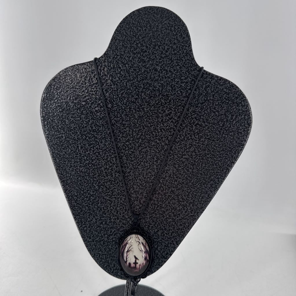 12" blk cord necklace w/oval stone/ crow pendant