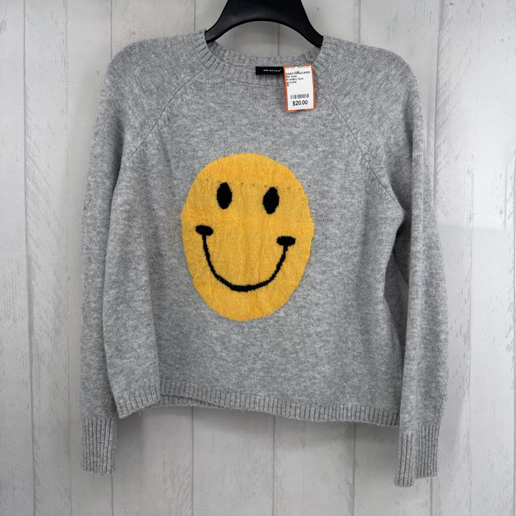 M smiley face sweater