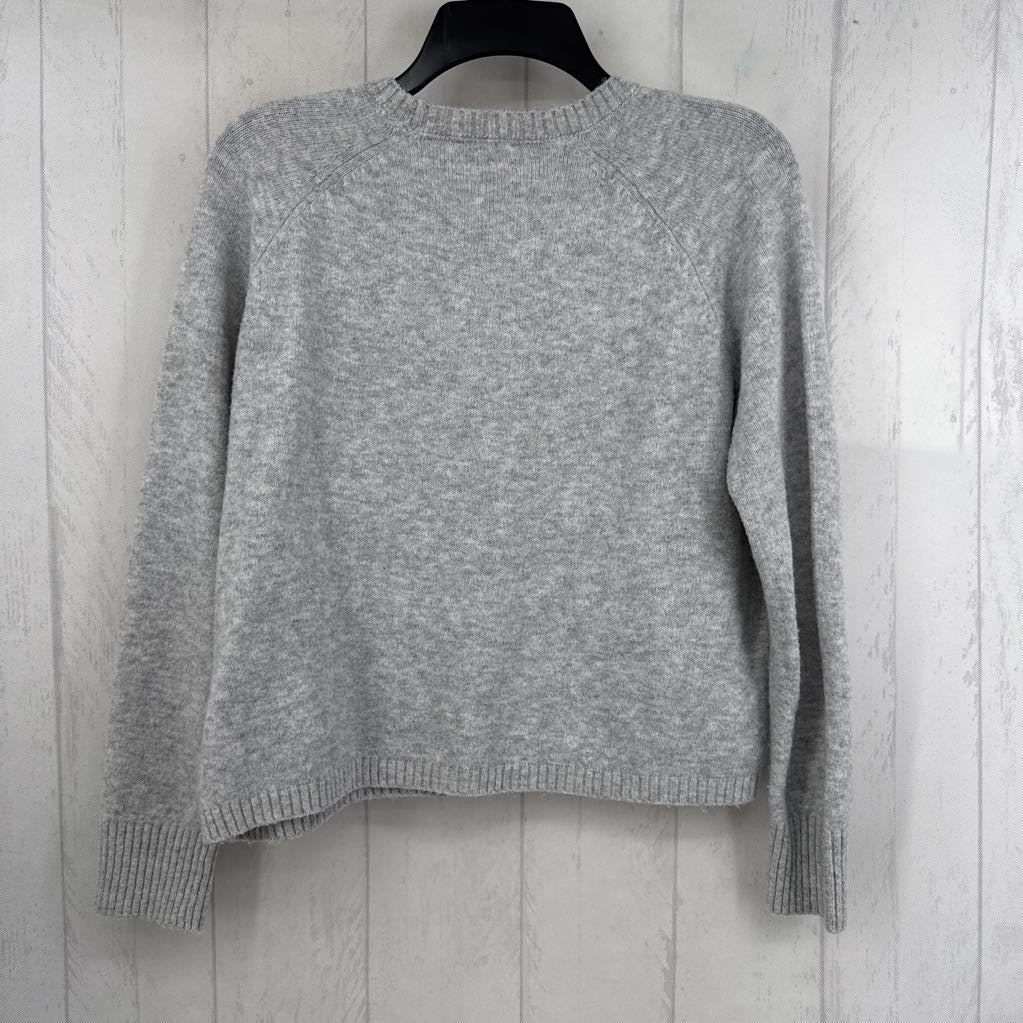 M smiley face sweater