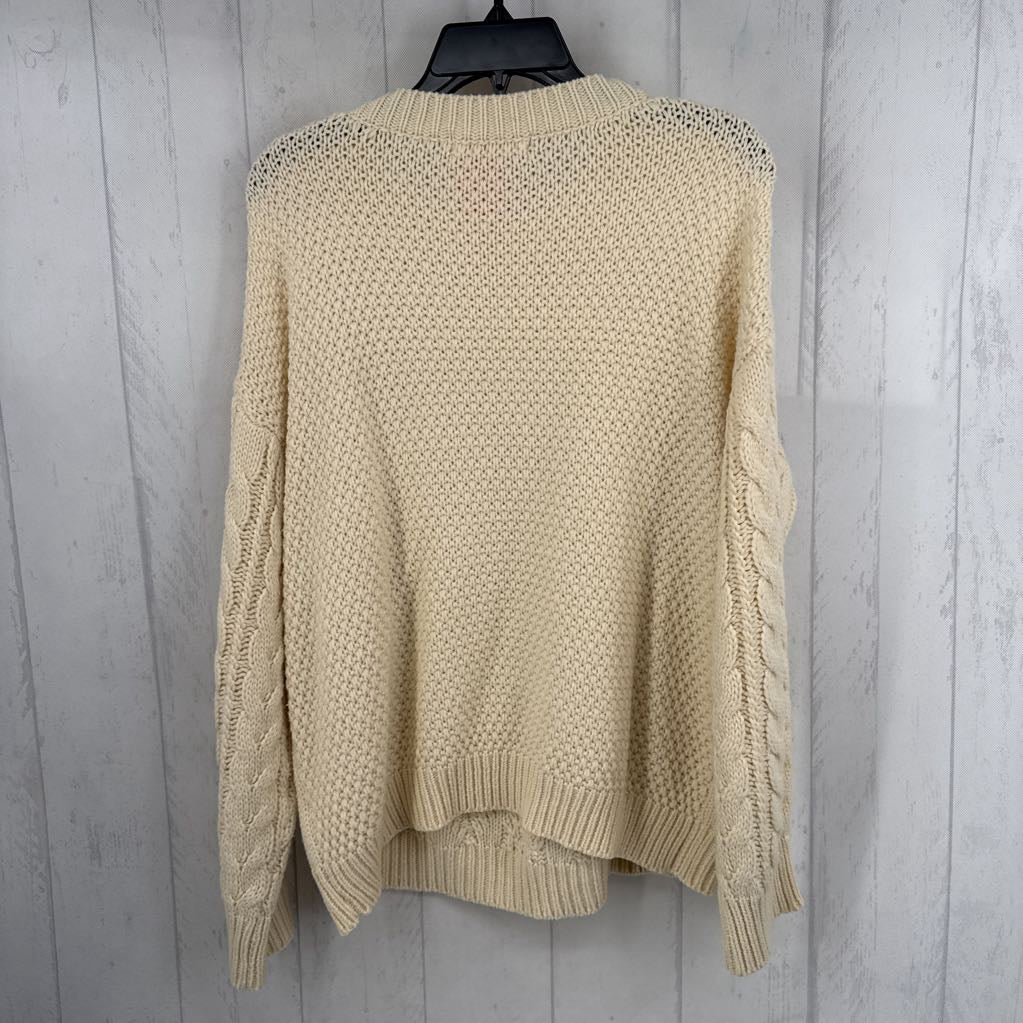 M cable knit sweater