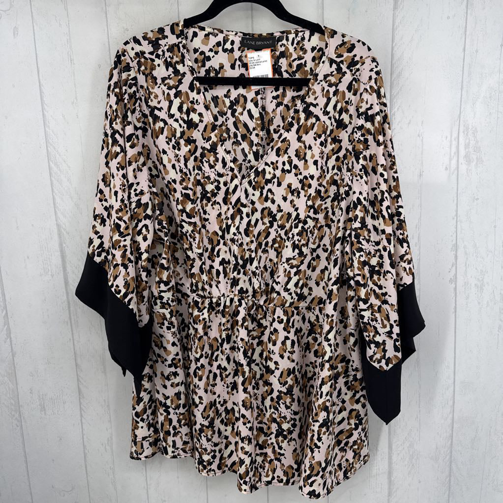 22/24 animal print v-neck l/s peplum top