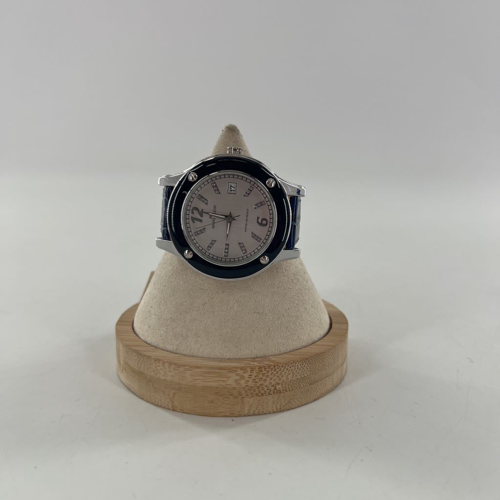 navy blue embossed leather strap watch