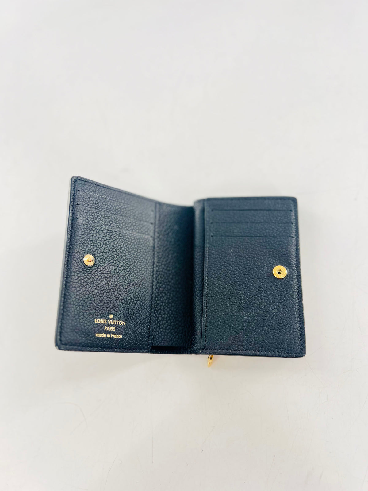 Clea embossed signature bi-fold wallet