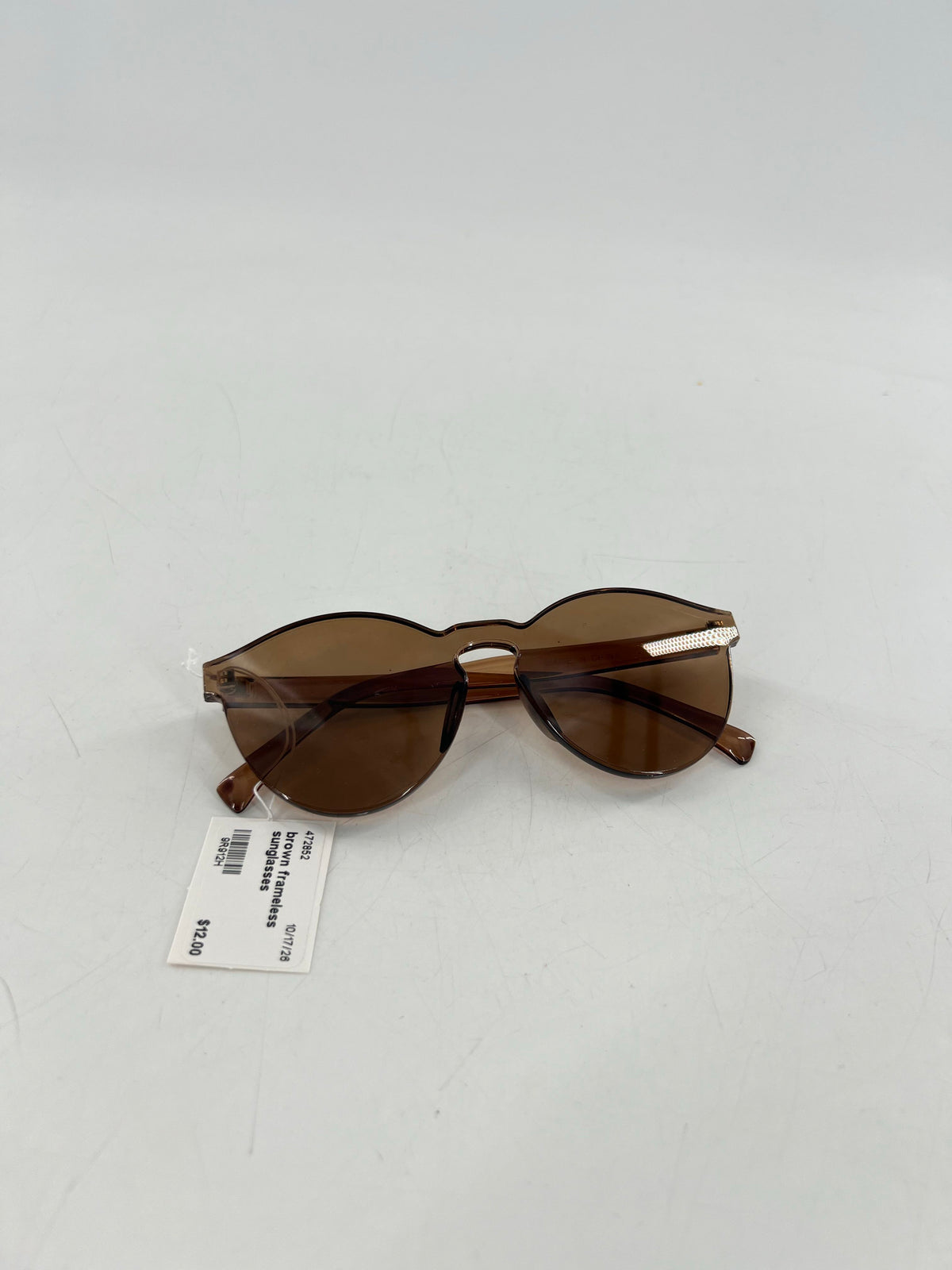 brown frameless sunglasses