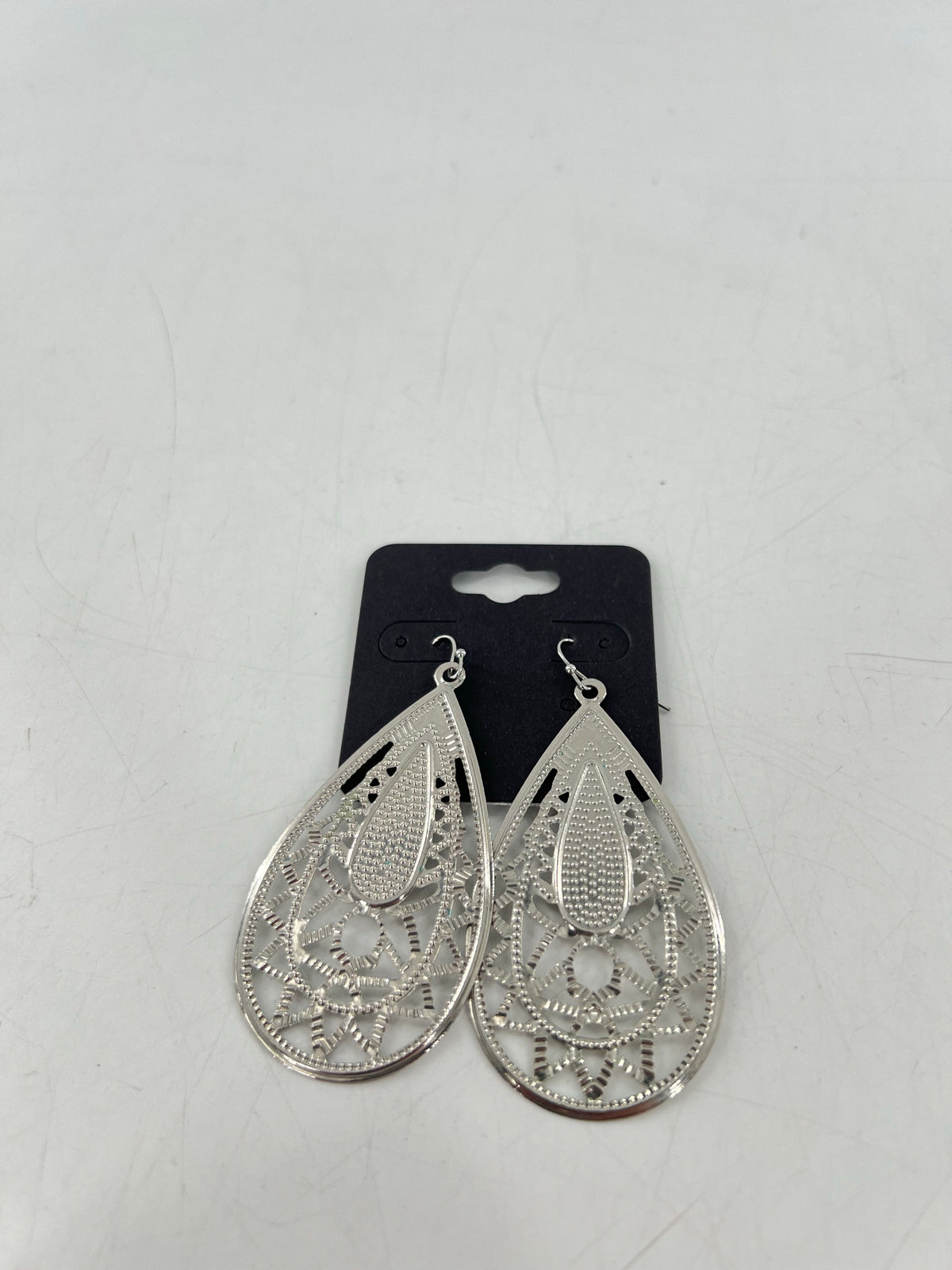 silver etched teardrop shape earrings
