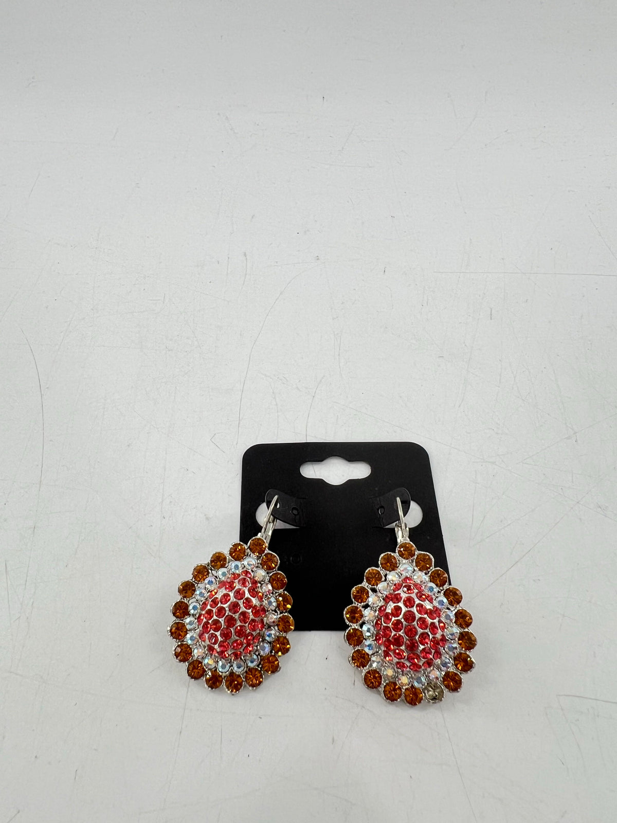 silver tone pink/orange crystal earrings