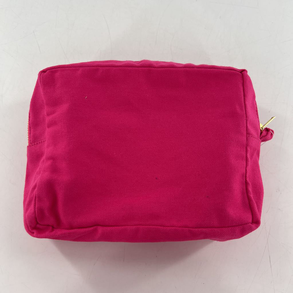pink zip around cosmetic bag