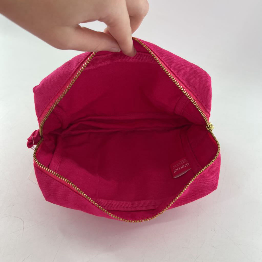 pink zip around cosmetic bag