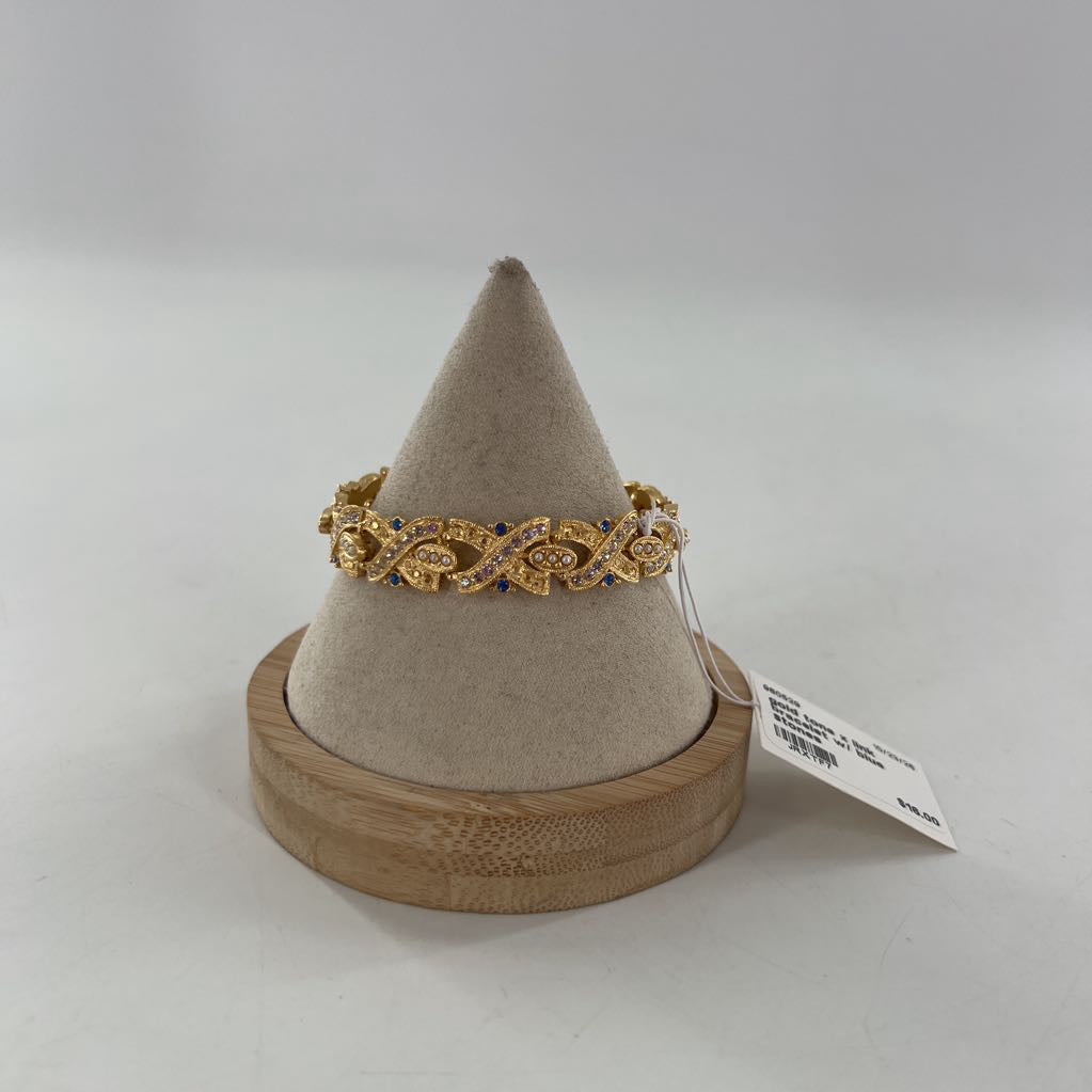 gold tone x link bracelet w/ blue stones