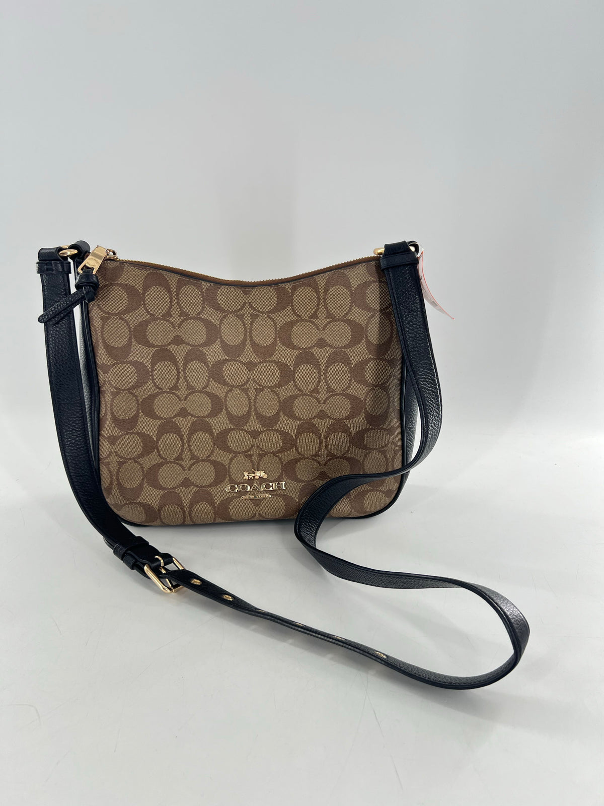 signature top zip crossbody file bag