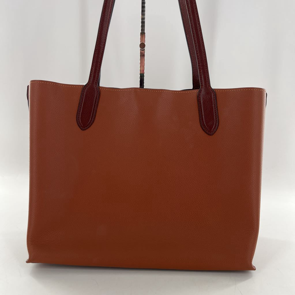 turnlock polished pebbled leather tote