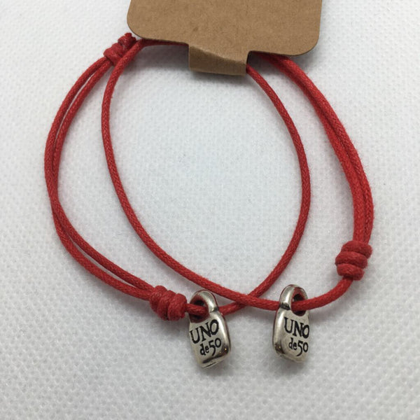 Two Red Leather Uno de 50 bracelets