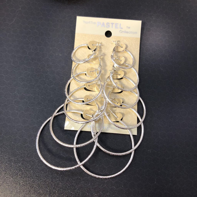 6 pair assorted silvertone hoop earrings